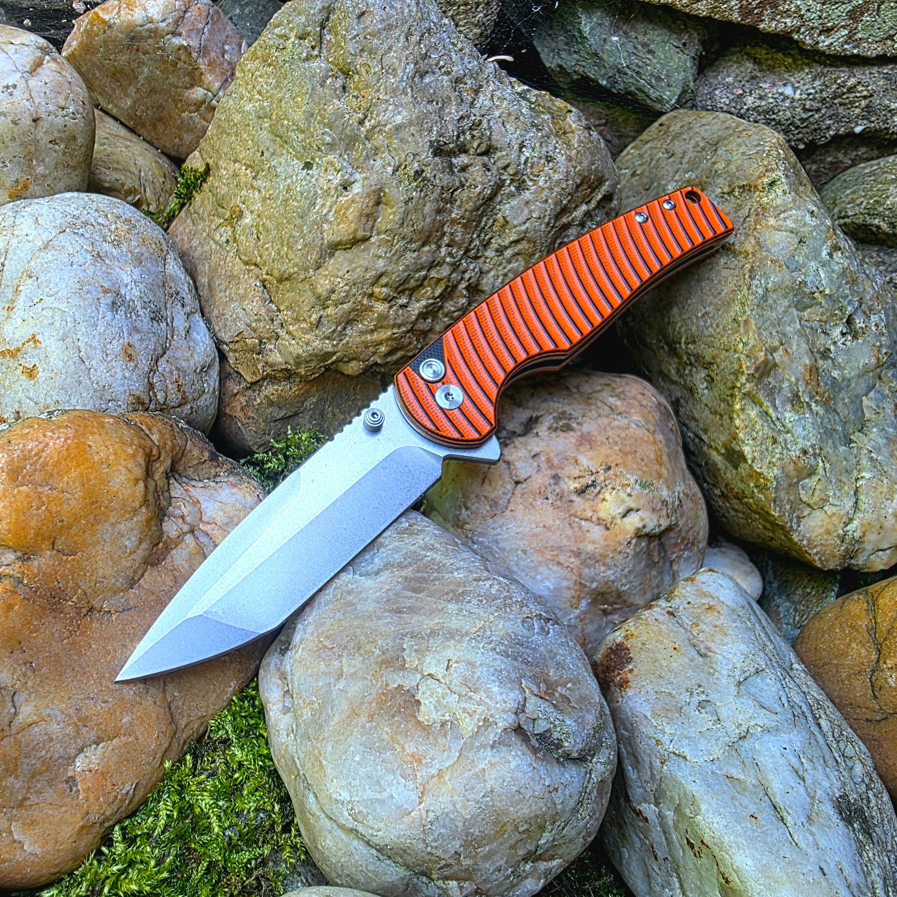 Zavírací nůž - Tanto D2 Button lock G10 orange